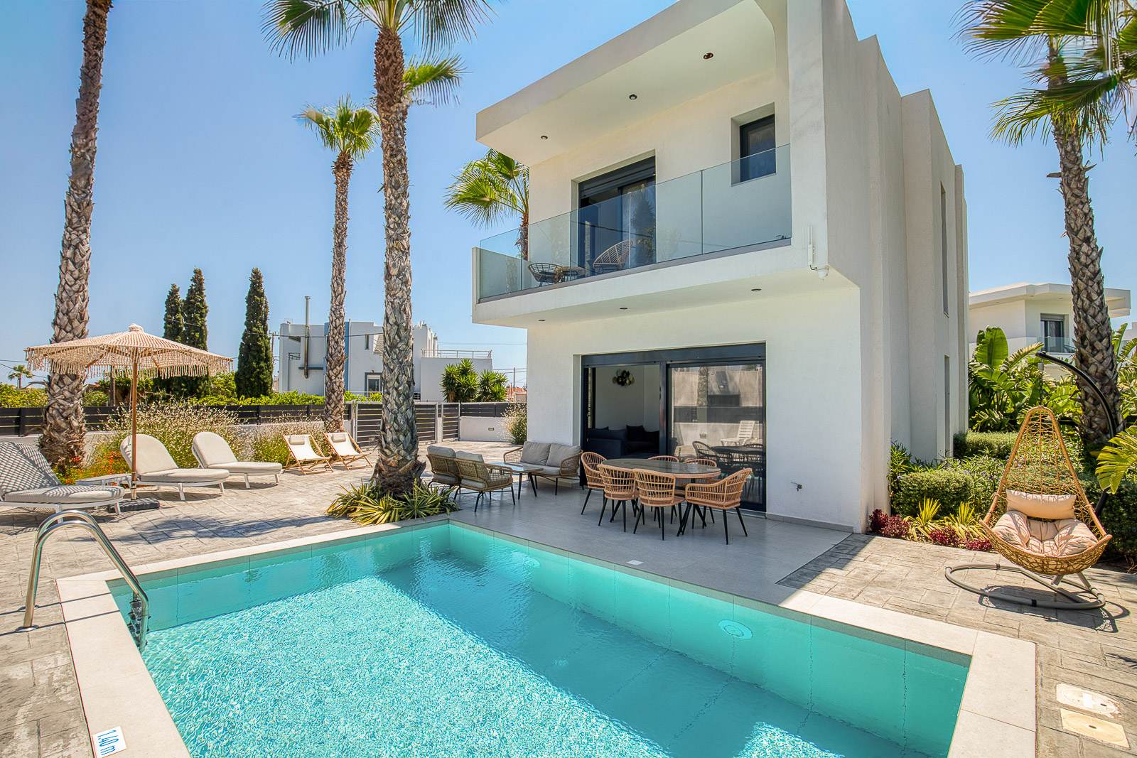Villa Eve seen across its private pool