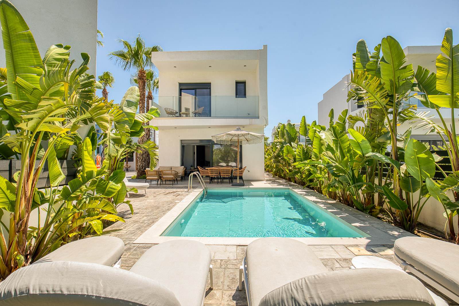 The Rea residence and its pool surrounded by tropical planting